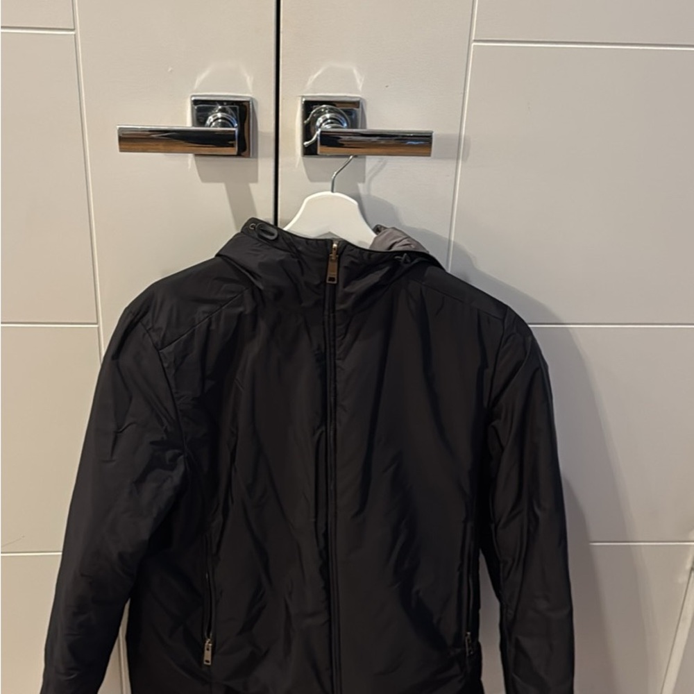 Prada sport reversibile jacket.. With red prada label on the sleeve.